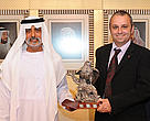 Christophe Tourenq (right) collects the Bish Brown Award from Sheikh Nayan.