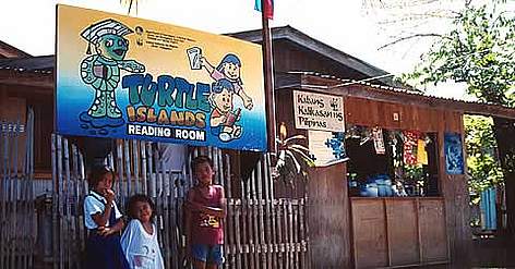 Community education centre set up by WWF Philippines for the Turtle Islands community and ... / ©: WWF-Canon / Soh Koon CHNG Community education centre set up by WWF Philippines for the Turtle Islands community and ... rel=