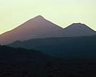 Muhabura and Gahinga volcanoes at sunrise, Virunga National Park, Democratic Republic of Congo.<BR>