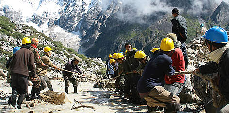 300 volunteers expanding the outlet channel of a glacier lake, Bhutan. / ©: Tashi Tshering/WWF Bhutan rel=