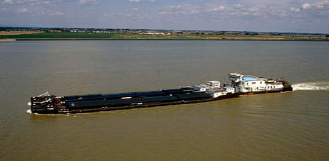 A barge traveling on the Danube River, which has been heavily modified for navigation. / ©: Paul GLENDELL / WWF-Canon rel=
