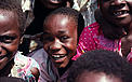 Children playing outside the Epulu Primary School. Democratic Republic of Congo. / ©: Sandra Mbanefo Obiago / WWF-Canon / ©: Sandra Mbanefo Obiago / WWF-Canon