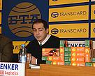 Two people next to giant boxes of matches