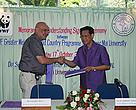 Mr. Guenther Meyer of WWF and Pongint Rukariyatum, PhD, Assoc. Professor, exchange the MOU.